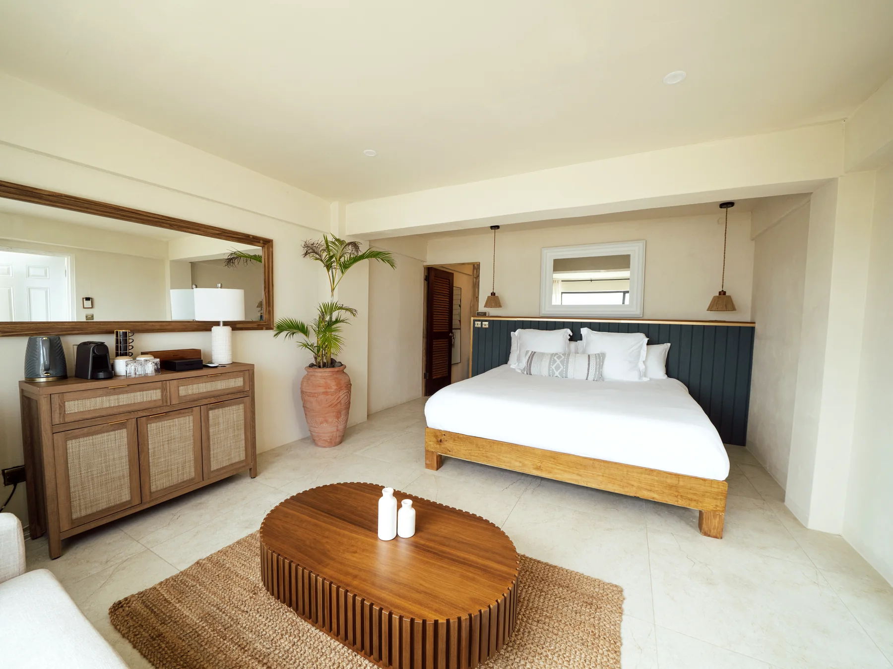 Private suite bedroom at Mer & Sel on Union Island