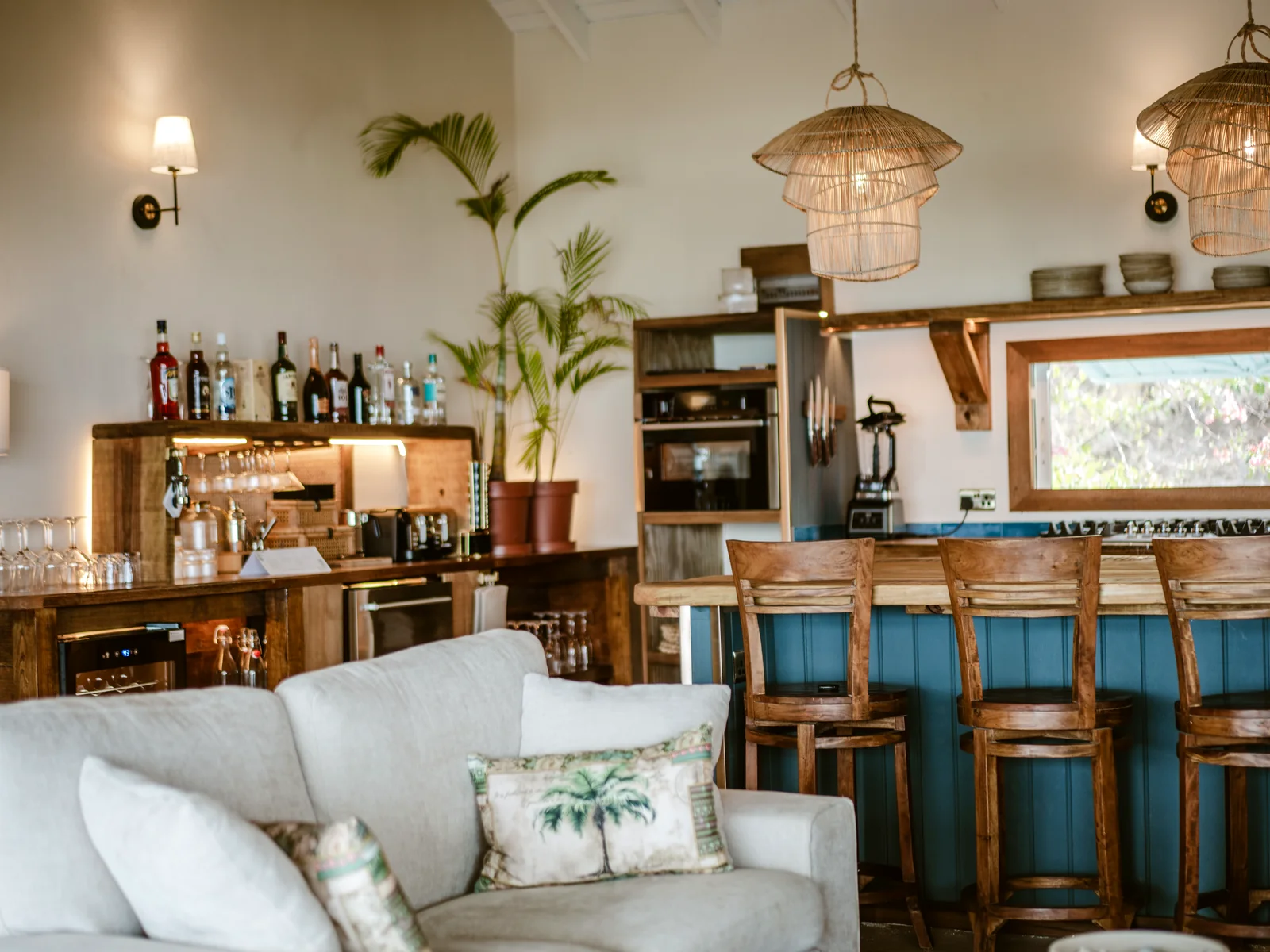 Private bar area with coffee machine, glassware, coolers, and wine storage at Mer & Sel Villa
